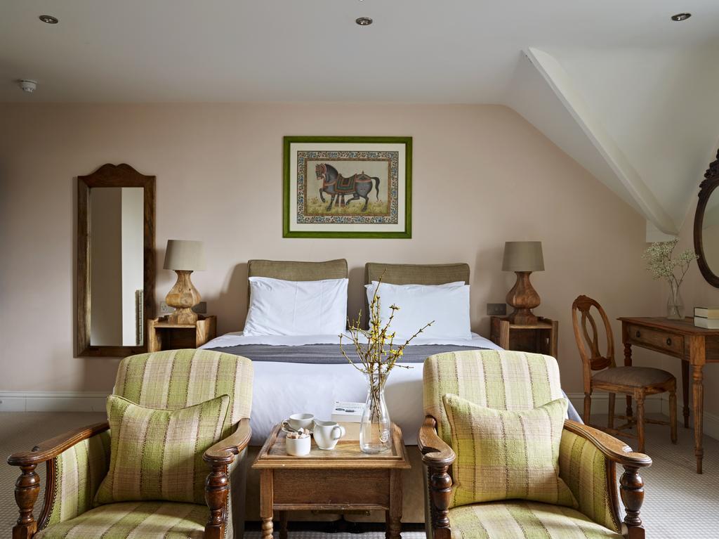 Bed and Breakfast Cotswold Grange Челтнем Екстер'єр фото A bedroom at the hotel