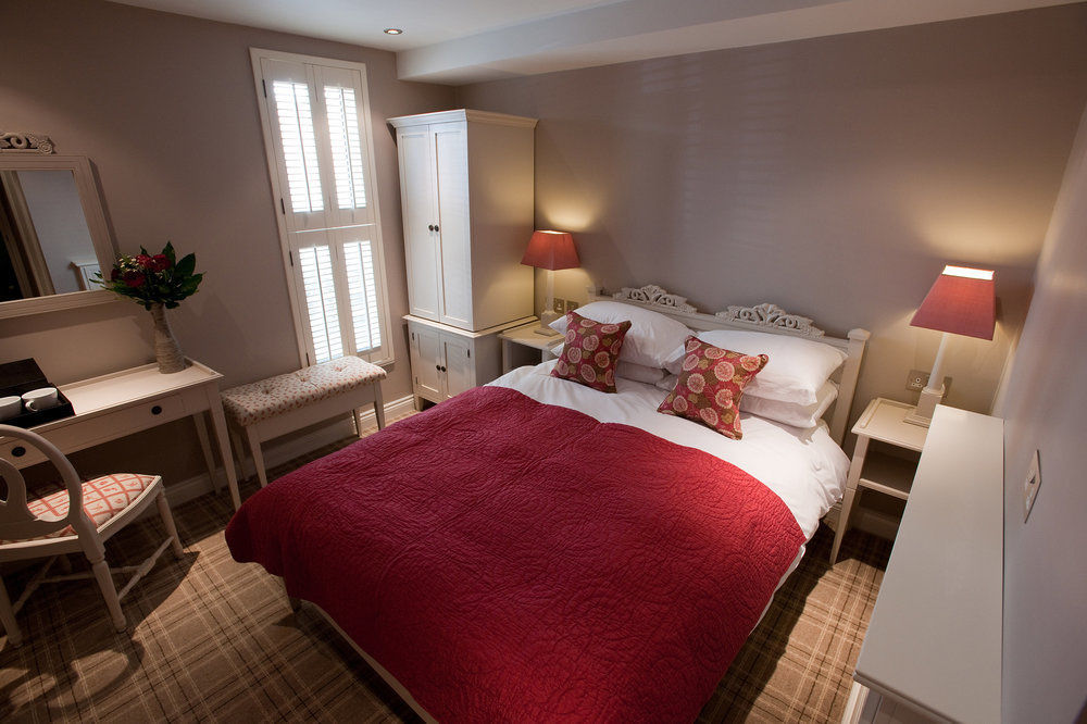 Bed and Breakfast Cotswold Grange Челтнем Екстер'єр фото A bedroom