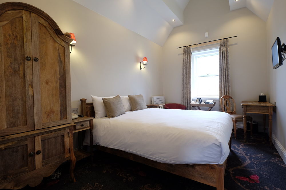 Bed and Breakfast Cotswold Grange Челтнем Екстер'єр фото A room at the hotel
