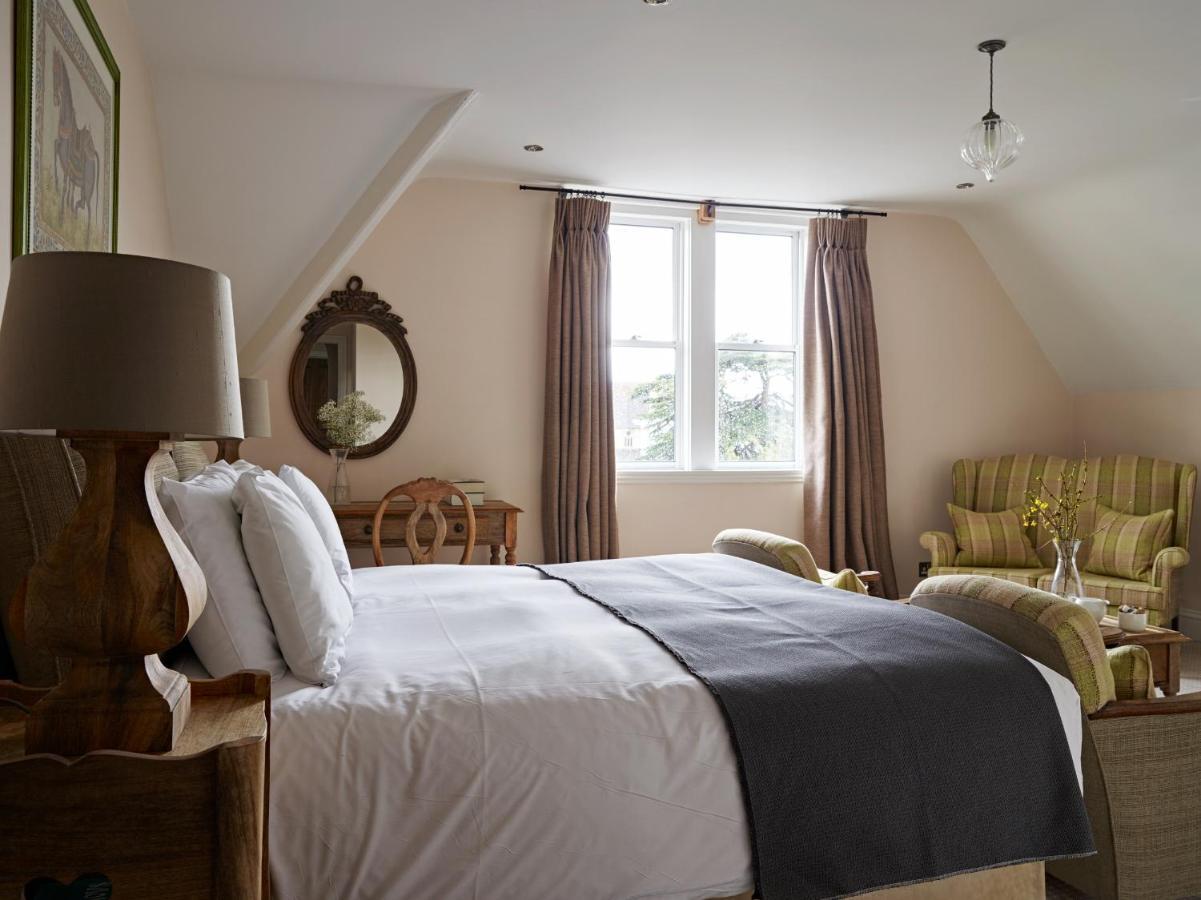 Bed and Breakfast Cotswold Grange Челтнем Екстер'єр фото A bedroom at The Pig